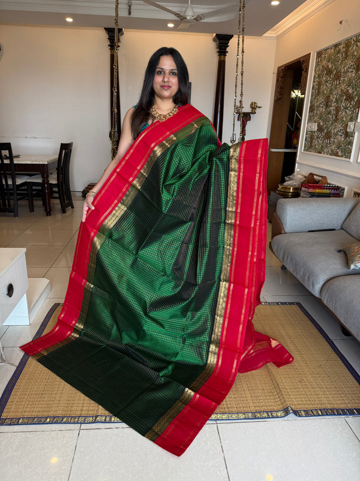 Green with Red , rich zari checks in the body , rettapet border and rich Pallu Korvai Silk Cotton Saree