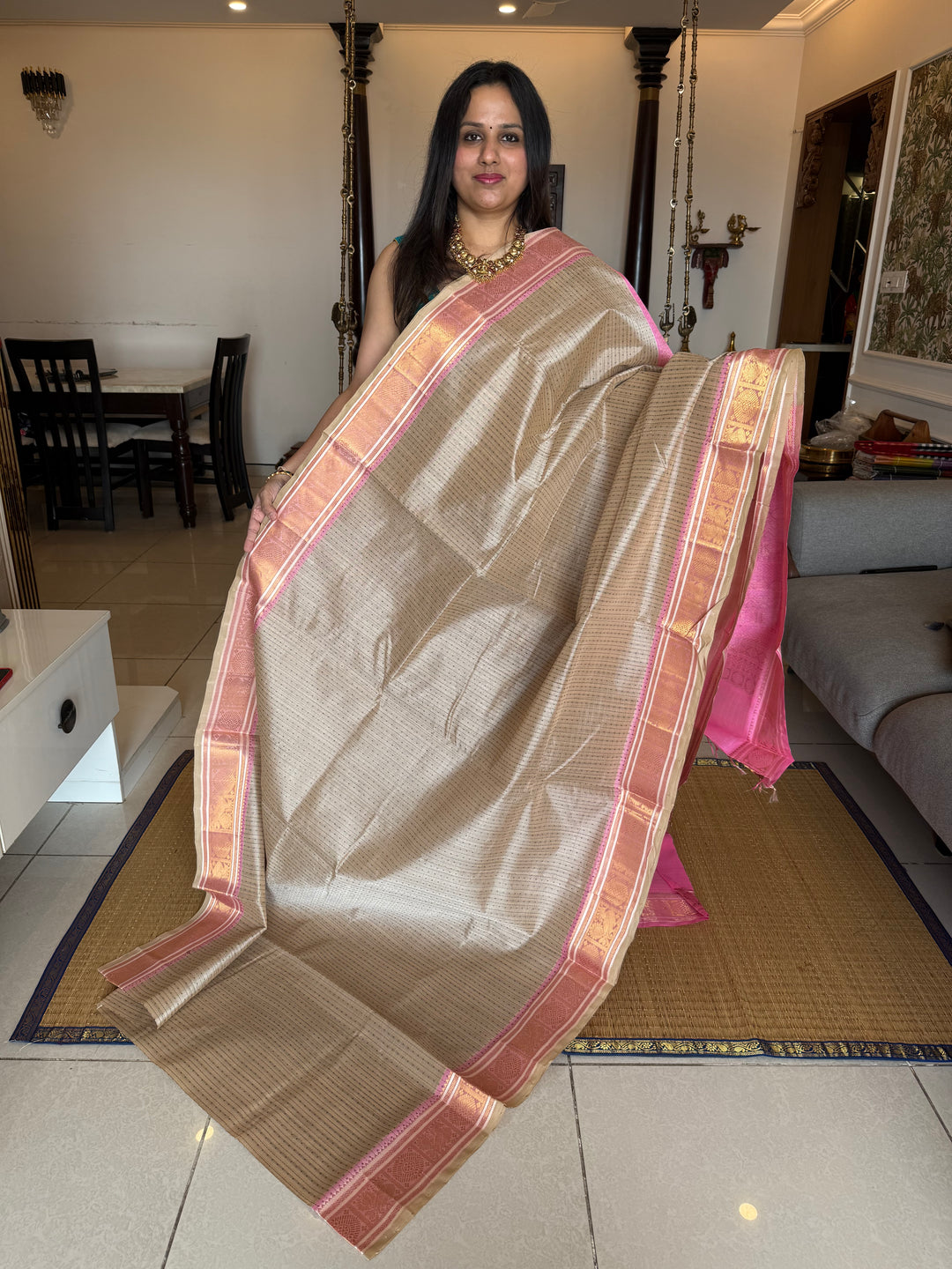 Offwhite with Baby Pink , Lakshadeepam butta in the body , traditional borders and rich Pallu Lakshadeepam Silk Cotton Saree