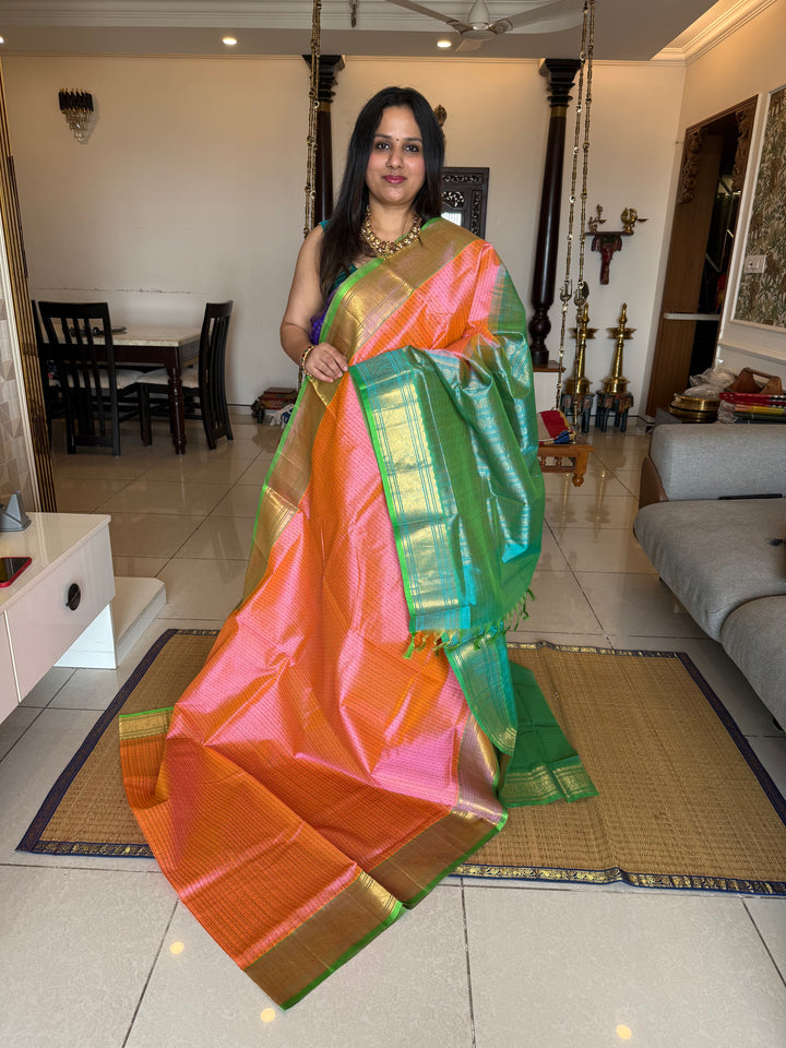 Baby Pink with Sea Green , Lakshadeepam butta in the body , traditional borders and rich Pallu Lakshadeepam Silk Cotton Saree