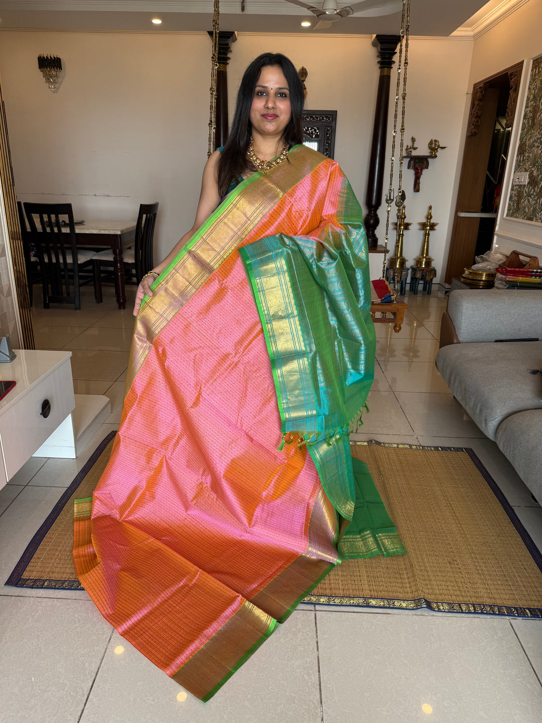 Baby Pink with Sea Green , Lakshadeepam butta in the body , traditional borders and rich Pallu Lakshadeepam Silk Cotton Saree