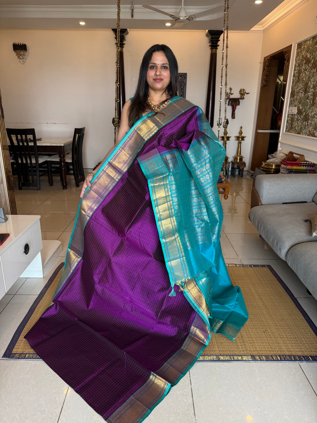 Purple with Turquoise Blue , Lakshadeepam butta in the body , traditional borders and rich Pallu Lakshadeepam Silk Cotton Saree