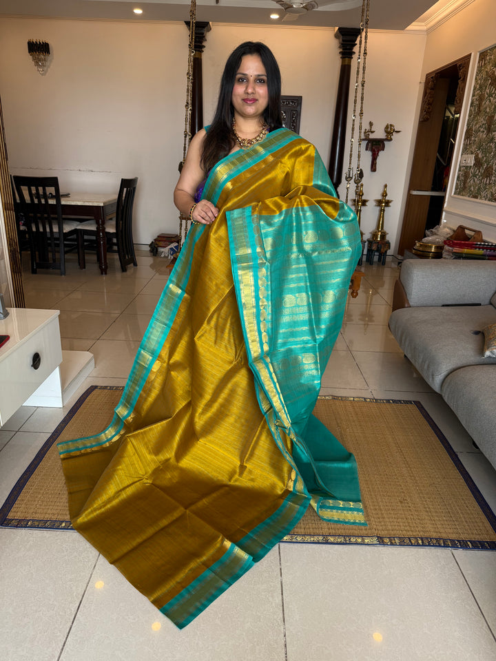 Vendhayam Fenugreek with Blue , kattam in the body , traditional borders and rich Pallu Korvai Silk Cotton Saree