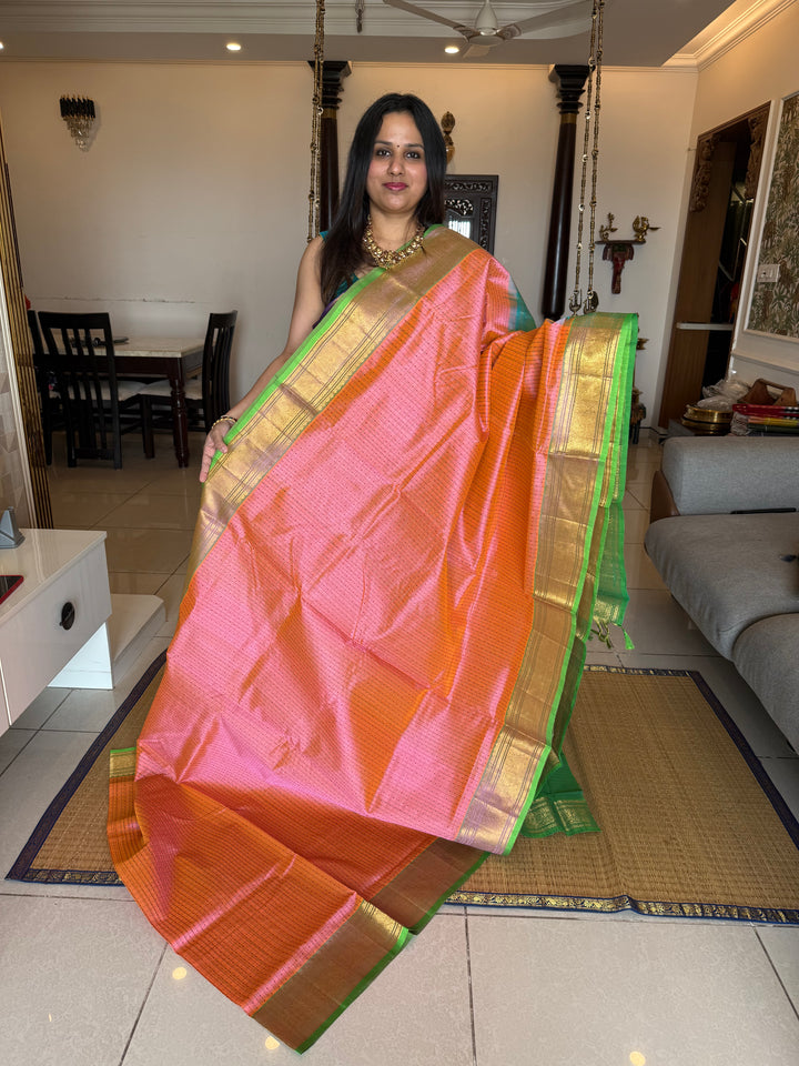 Baby Pink with Sea Green , Lakshadeepam butta in the body , traditional borders and rich Pallu Lakshadeepam Silk Cotton Saree