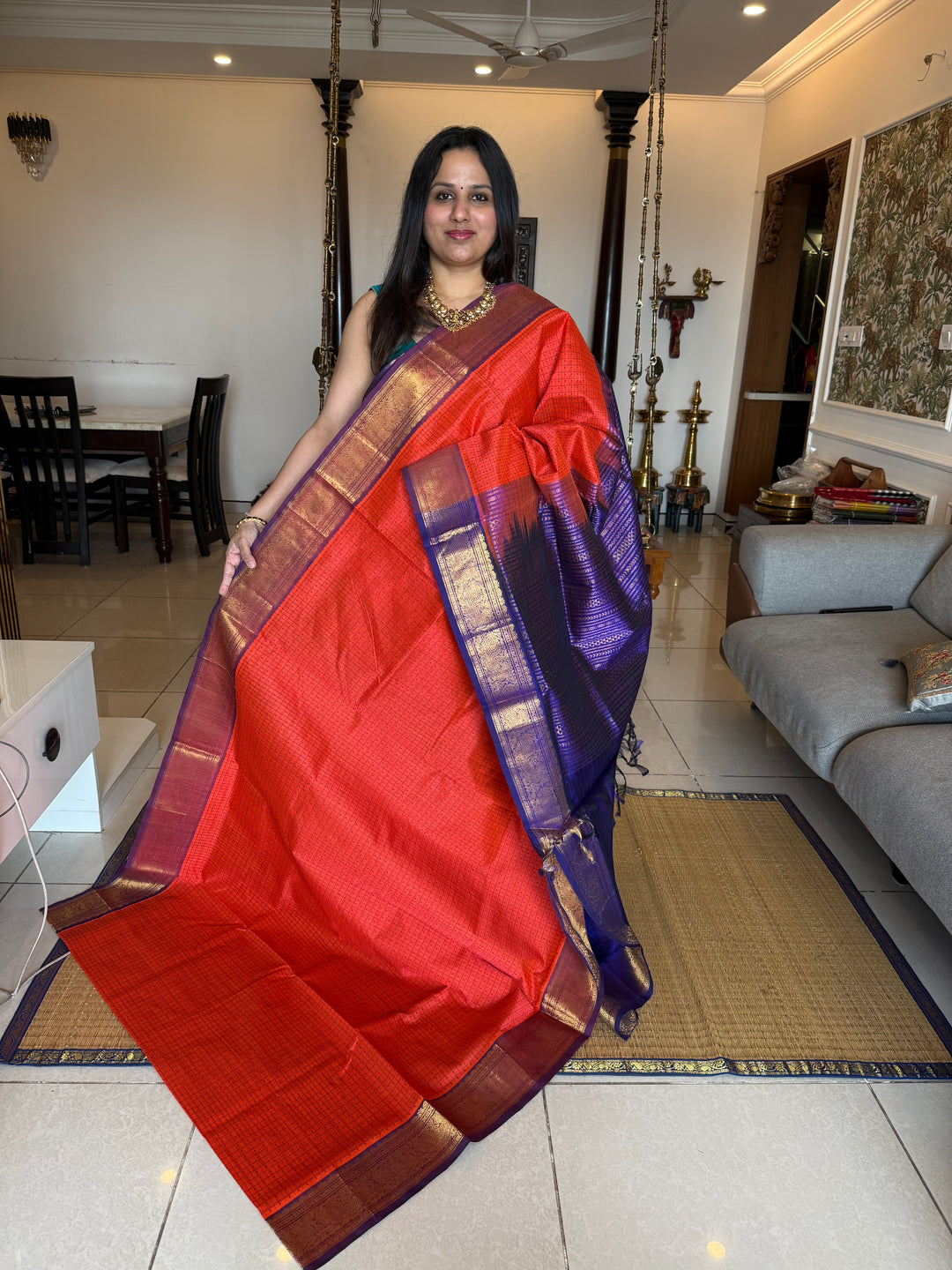 Orange with Blue , Lakshadeepam butta in the body , traditional borders and rich Pallu Lakshadeepam Silk Cotton Saree
