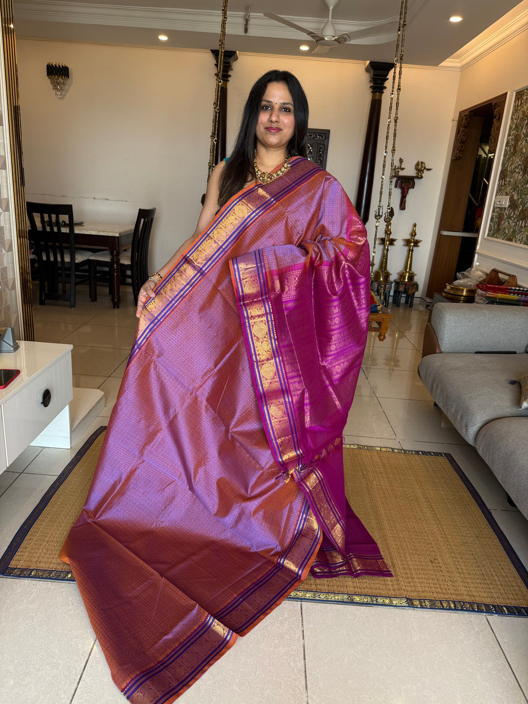 Lavender with Purple , Lakshadeepam butta in the body , traditional borders and rich Pallu Lakshadeepam Silk Cotton Saree