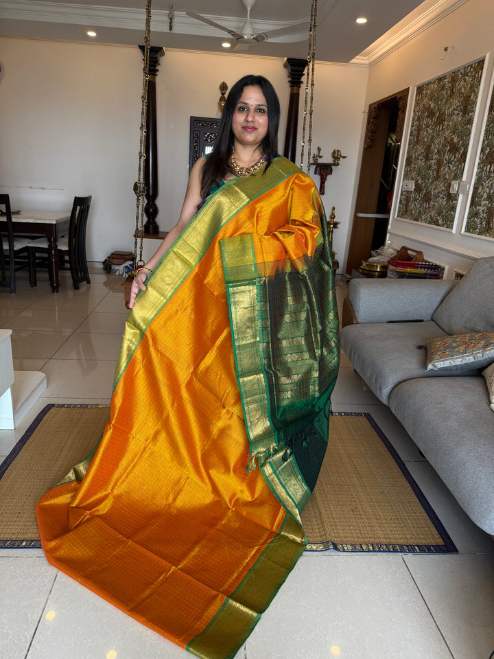 Manjal with Green , Lakshadeepam butta in the body , traditional borders and rich Pallu Lakshadeepam Silk Cotton Saree
