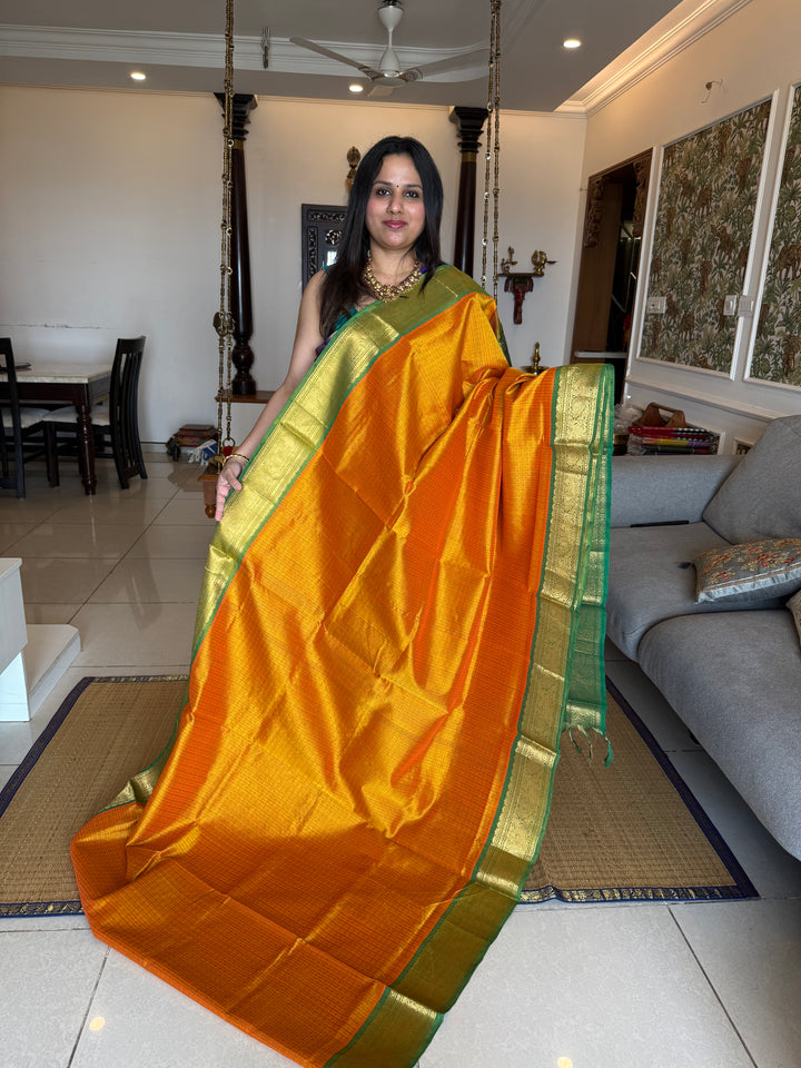 Manjal with Green , Lakshadeepam butta in the body , traditional borders and rich Pallu Lakshadeepam Silk Cotton Saree