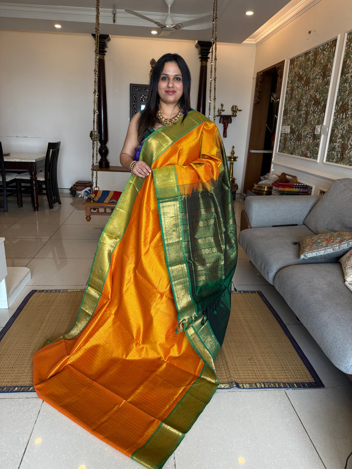 Manjal with Green , Lakshadeepam butta in the body , traditional borders and rich Pallu Lakshadeepam Silk Cotton Saree