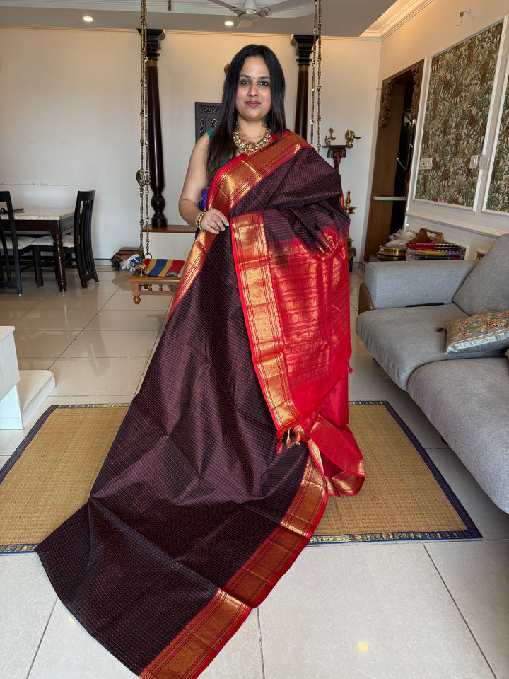 Dark Brown with Red , Lakshadeepam butta in the body , traditional borders and rich Pallu Lakshadeepam Silk Cotton Saree