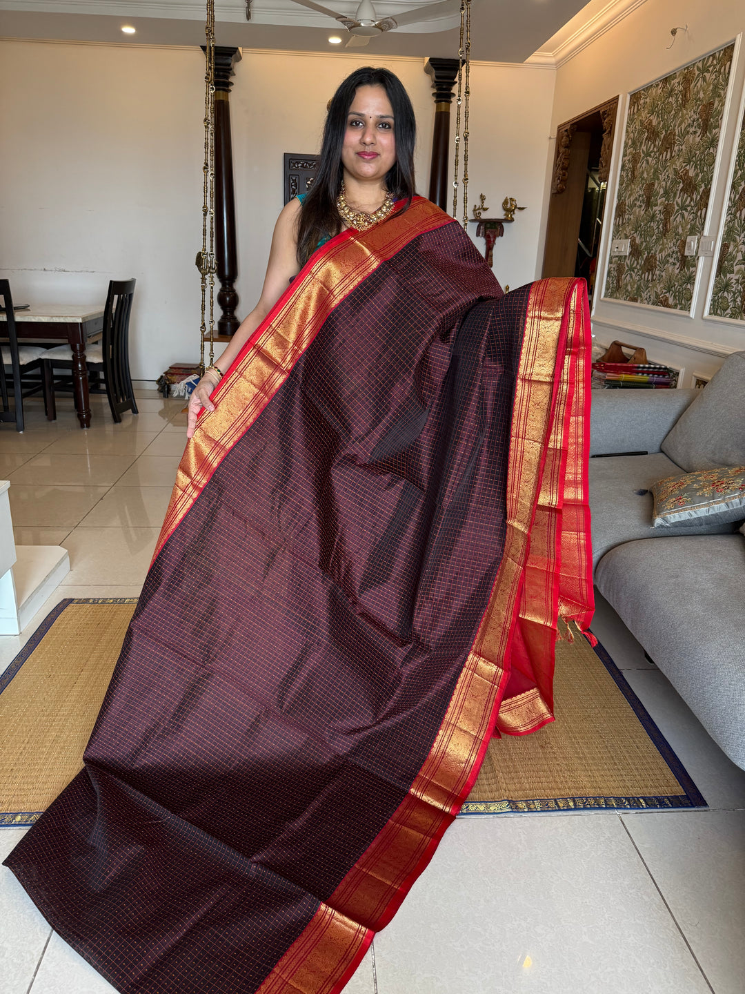 Dark Brown with Red , Lakshadeepam butta in the body , traditional borders and rich Pallu Lakshadeepam Silk Cotton Saree