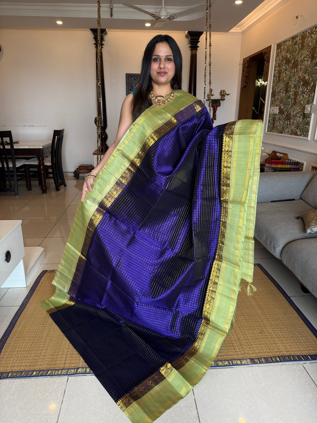 Blue with Pastel Green , rich zari checks in the body , rettapet border and rich Pallu Korvai Silk Cotton Saree