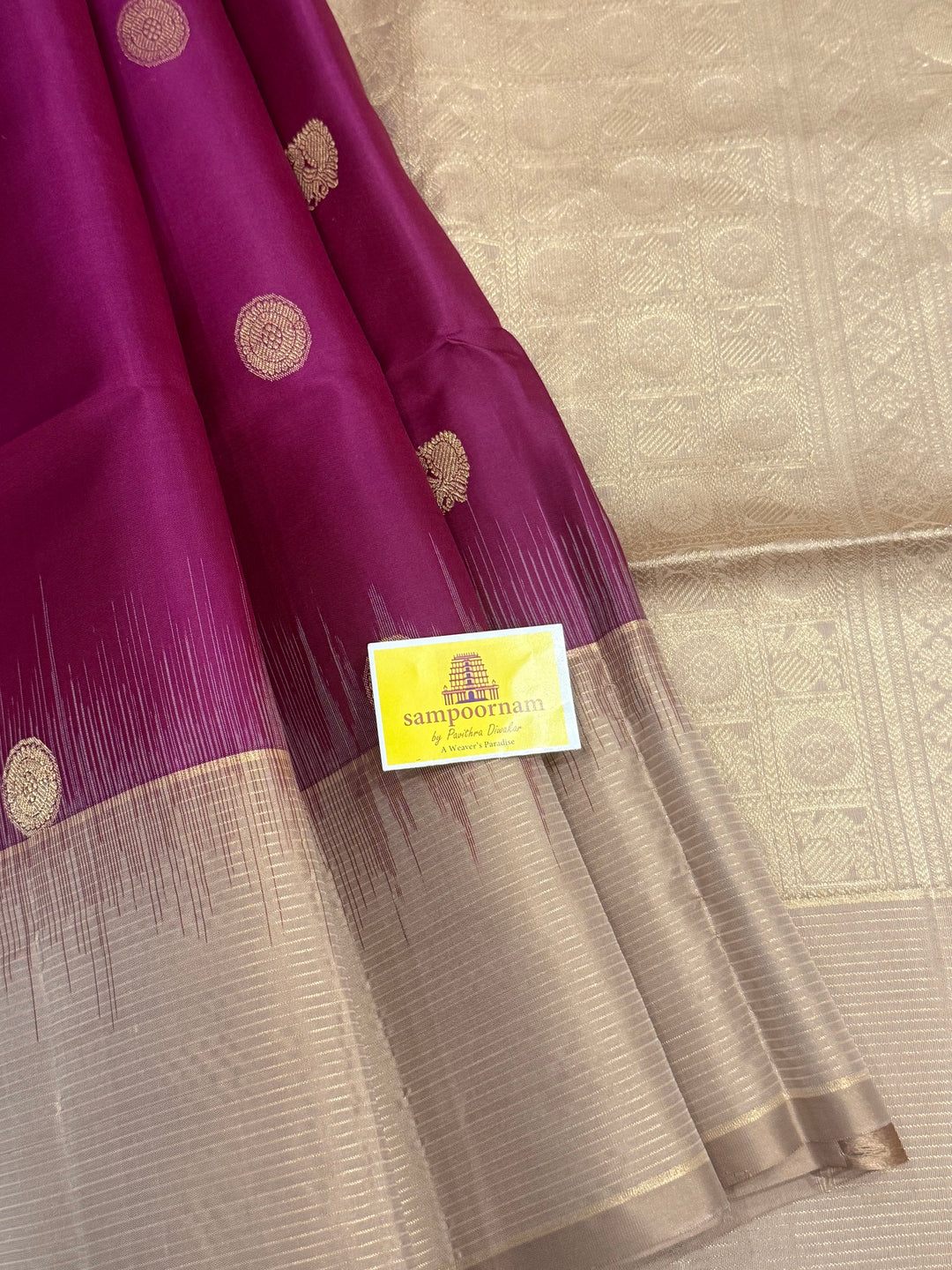 Dark Wine with Beige , rich Zari annam and rudraksh butta in the body and vairaoosi border , pure soft silk saree