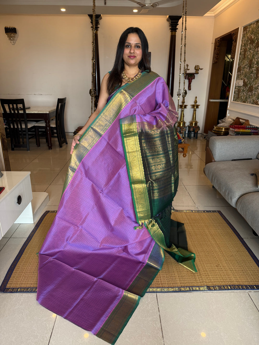 Lavender with Green , Lakshadeepam butta in the body , traditional borders and rich Pallu Lakshadeepam Silk Cotton Saree