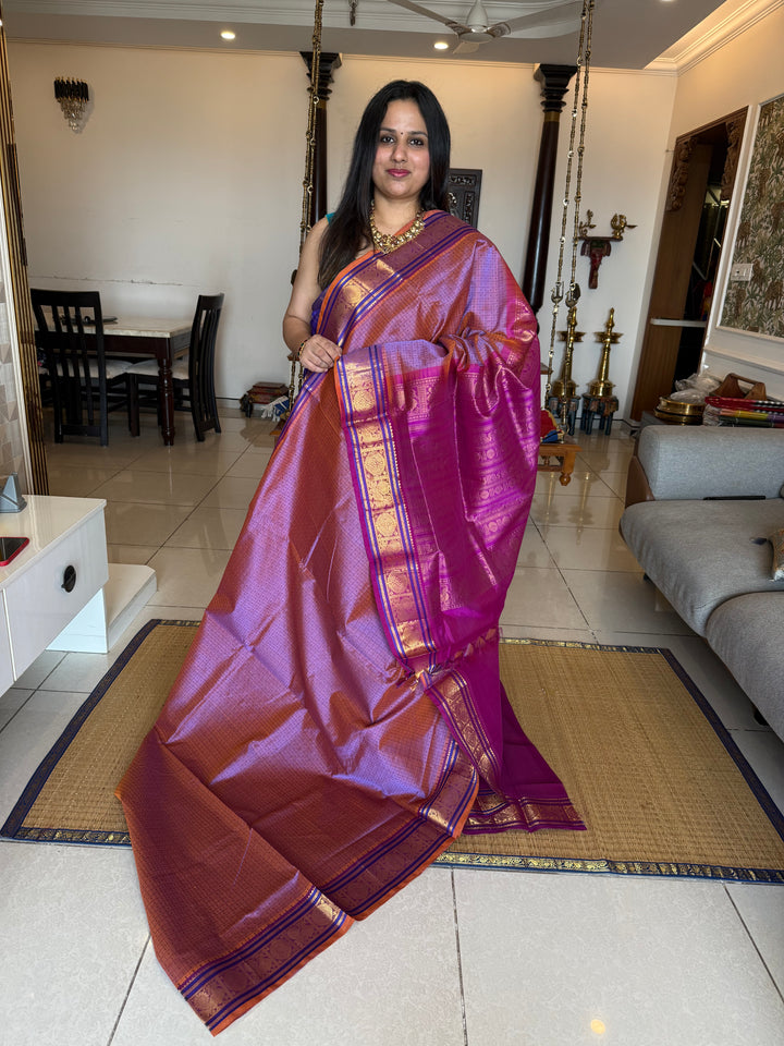 Lavender with Purple , Lakshadeepam butta in the body , traditional borders and rich Pallu Lakshadeepam Silk Cotton Saree