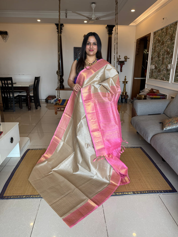 Offwhhite with Baby Pink , Lakshadeepam butta in the body , traditional borders and rich Pallu Lakshadeepam Silk Cotton Saree