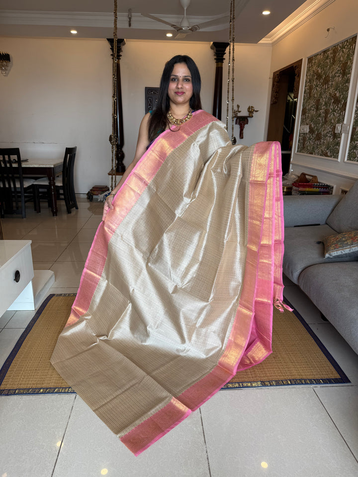 Offwhhite with Baby Pink , Lakshadeepam butta in the body , traditional borders and rich Pallu Lakshadeepam Silk Cotton Saree