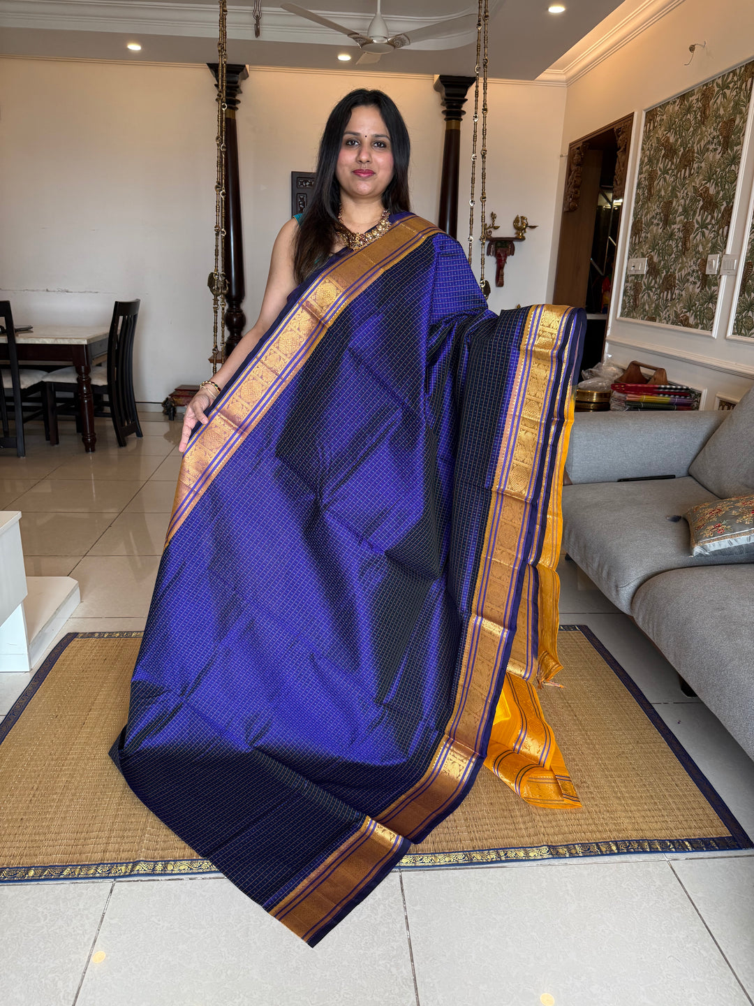 Blue with Yellow , Lakshadeepam butta in the body , traditional borders and rich Pallu Lakshadeepam Silk Cotton Saree