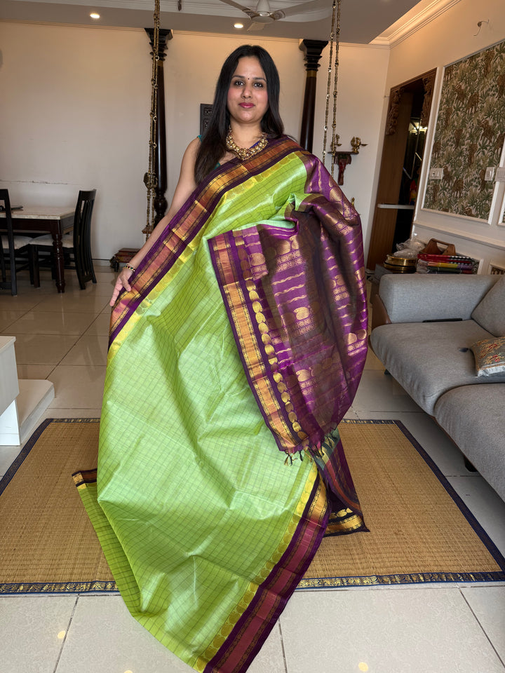 Pastel Green with Purple , kattam in the body , traditional borders and rich Pallu Korvai Silk Cotton Saree