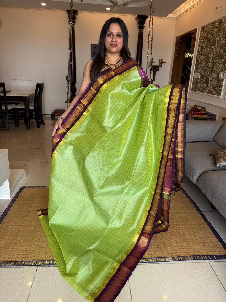 Pastel Green with Purple , kattam in the body , traditional borders and rich Pallu Korvai Silk Cotton Saree