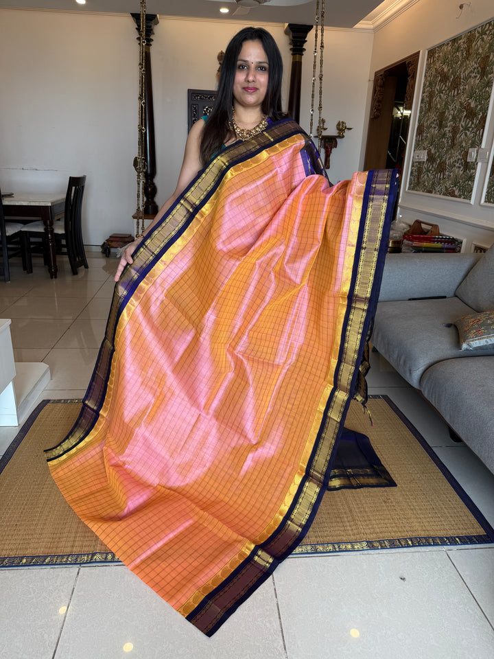 Peachish  Pink with Blue , kattam in the body , traditional borders and rich Pallu Korvai Silk Cotton Saree
