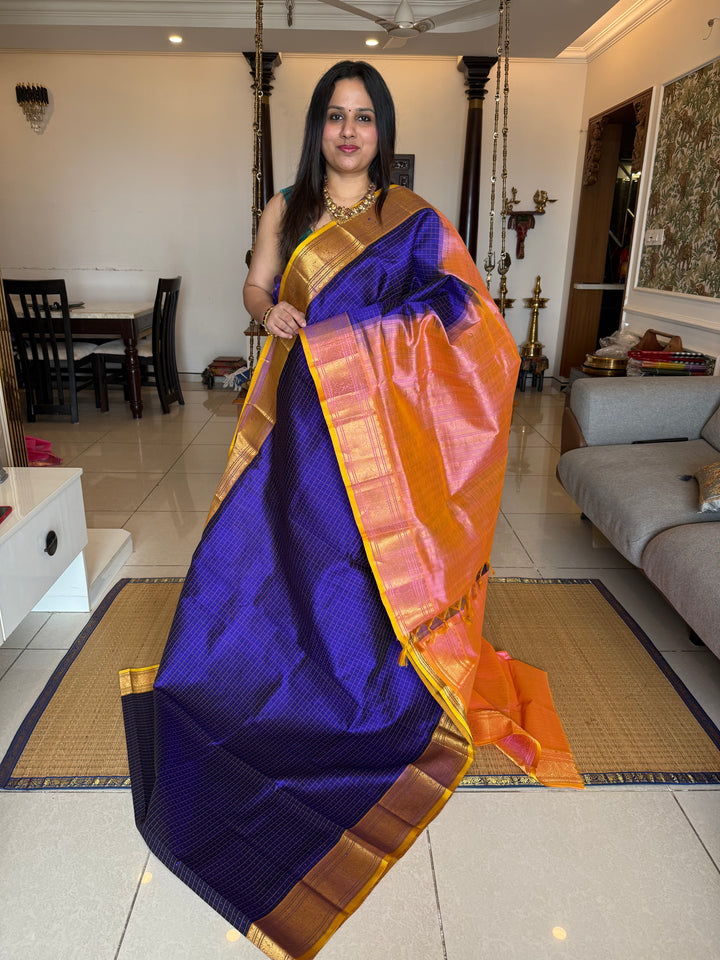 Blue with Baby Pink and Yellow sell edge , Lakshadeepam butta in the body , traditional borders and rich Pallu Lakshadeepam Silk Cotton Saree