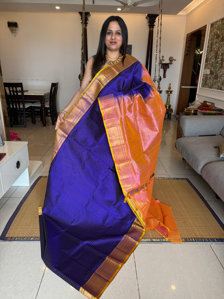 Blue with Baby Pink and Yellow sell edge , Lakshadeepam butta in the body , traditional borders and rich Pallu Lakshadeepam Silk Cotton Saree
