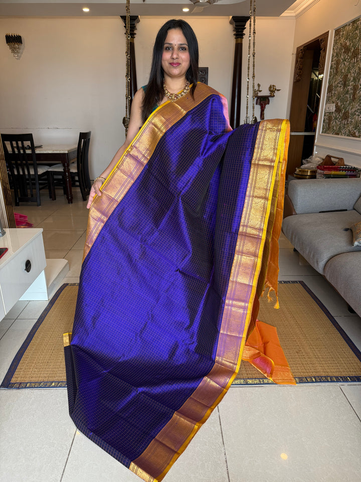Blue with Baby Pink and Yellow sell edge , Lakshadeepam butta in the body , traditional borders and rich Pallu Lakshadeepam Silk Cotton Saree