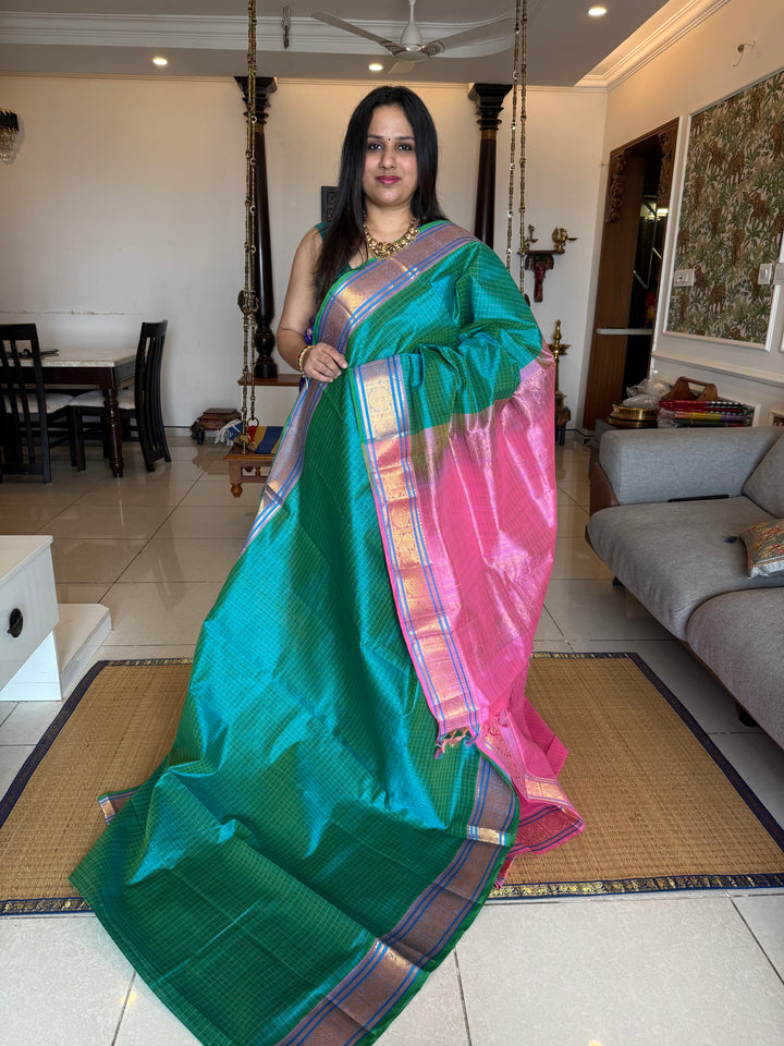 Turquoise Blue with Baby Pink , Lakshadeepam butta in the body , traditional borders and rich Pallu Lakshadeepam Silk Cotton Saree