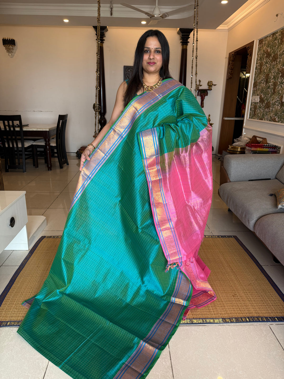 Turquoise Blue with Baby Pink , Lakshadeepam butta in the body , traditional borders and rich Pallu Lakshadeepam Silk Cotton Saree