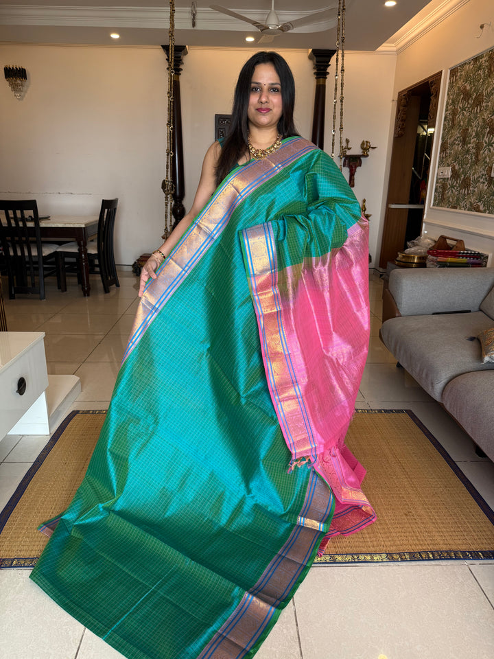 Turquoise Blue with Baby Pink , Lakshadeepam butta in the body , traditional borders and rich Pallu Lakshadeepam Silk Cotton Saree