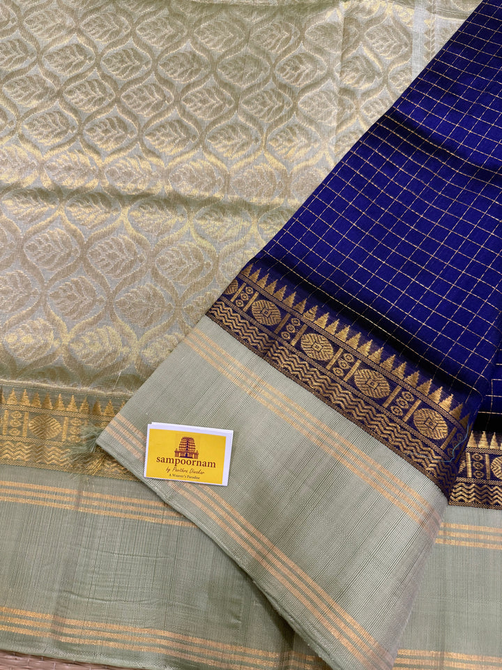 Blue with Pastel Green , rich zari checks in the body , rettapet border and rich Pallu Korvai Silk Cotton Saree