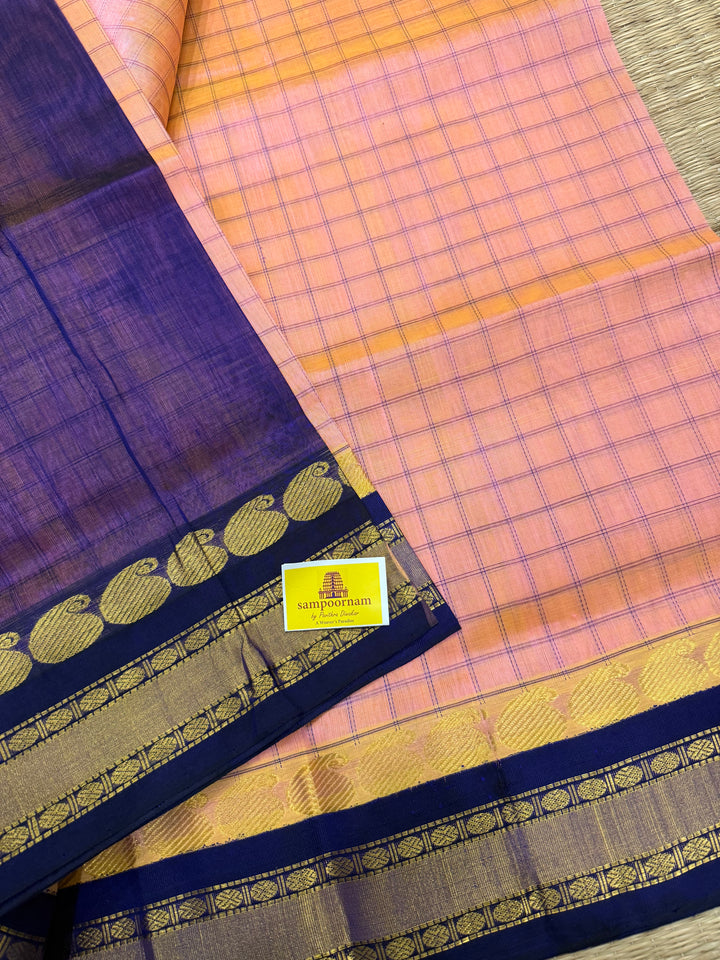 Peachish  Pink with Blue , kattam in the body , traditional borders and rich Pallu Korvai Silk Cotton Saree