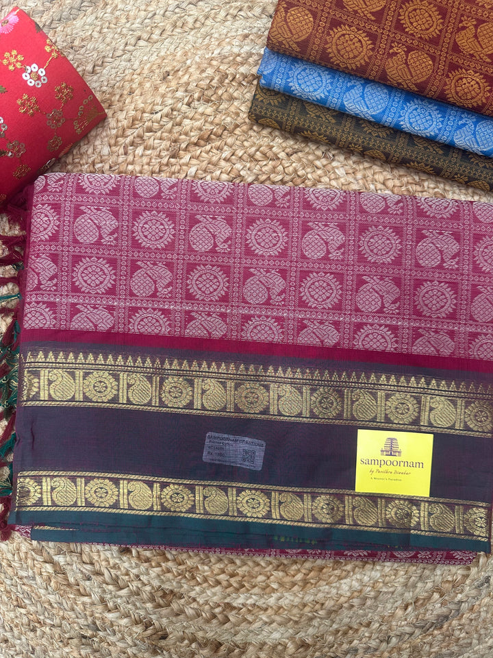 Red with Manthulir Green , Annam and Chakram thread butta in the body  , rettapet border and simple Plain Chettinad Cotton Saree