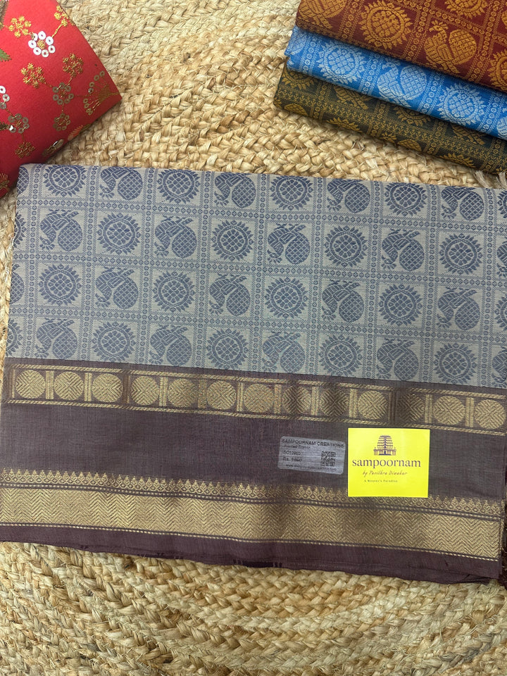 Dark Beige with sandstone   , Annam and Chakram thread butta in the body  , rettapet border and Plain Pallu Chettinad Cotton Saree