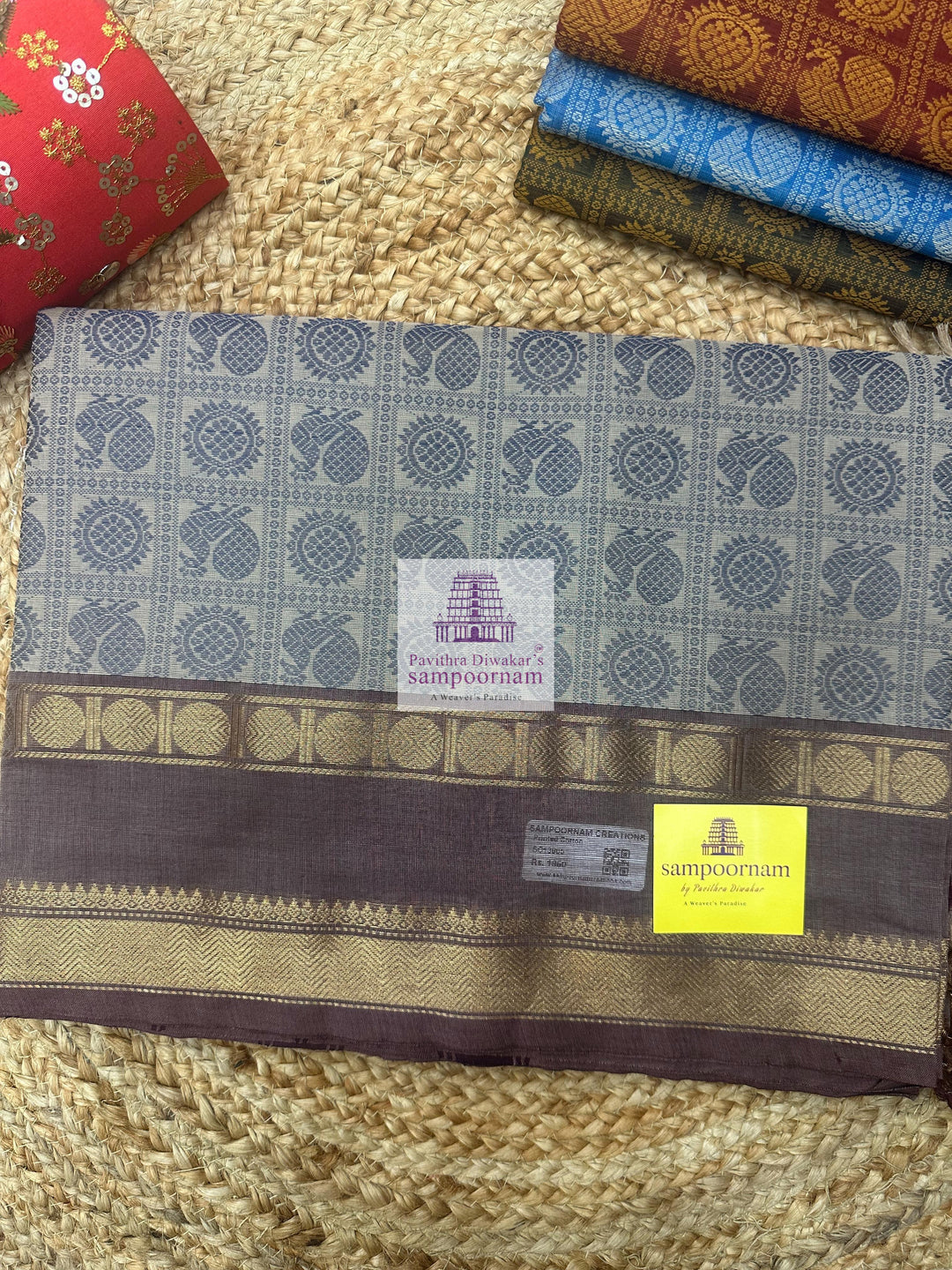 Cream with Grey  , Annam and Chakram thread butta in the body  , rettapet border and plain Pallu Chettinad Cotton Saree