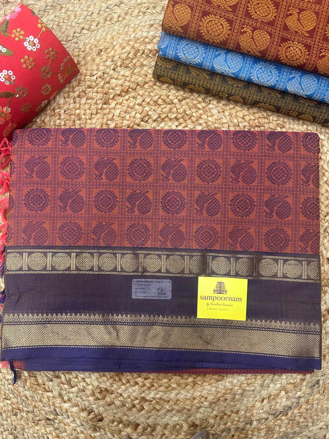 Light Coral with Blue  , Annam and Chakram thread butta in the body  , rettapet border and Plain Pallu Chettinad Cotton Saree