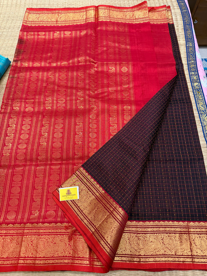 Dark Brown with Red , Lakshadeepam butta in the body , traditional borders and rich Pallu Lakshadeepam Silk Cotton Saree