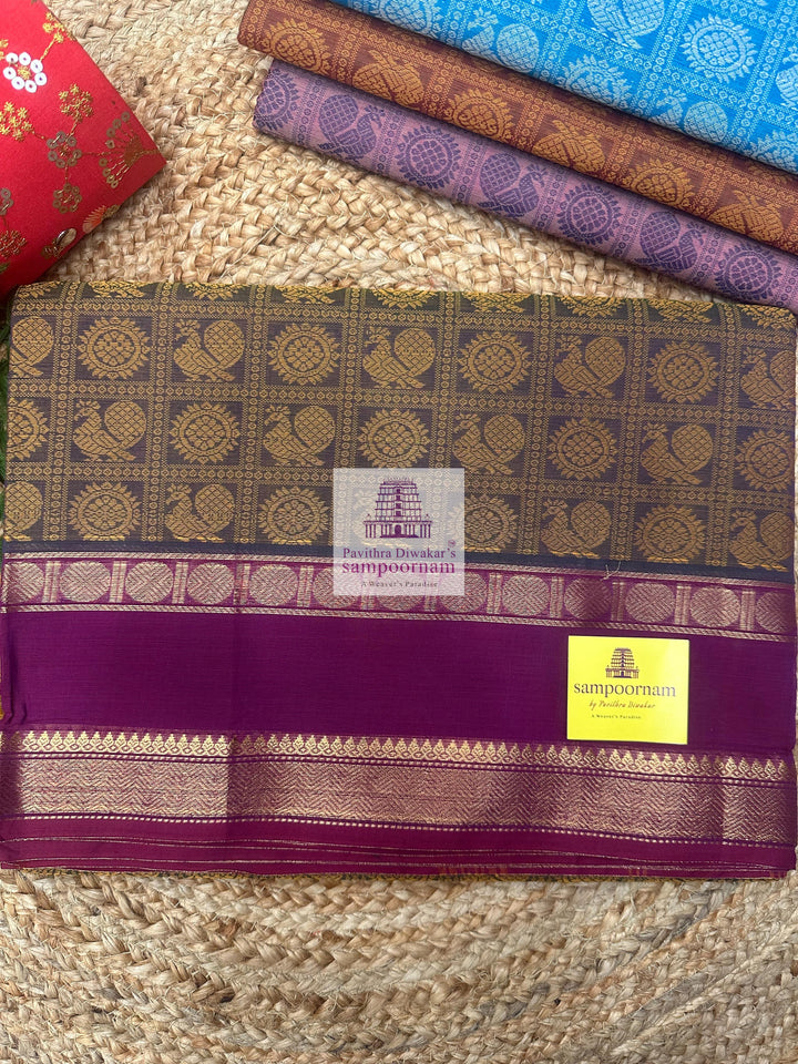 Light Green Ganga Jamuna Border Magenta with Mustard  , Annam and Chakram thread butta in the body  , rettapet border and Plain  Pallu Chettinad Cotton Saree
