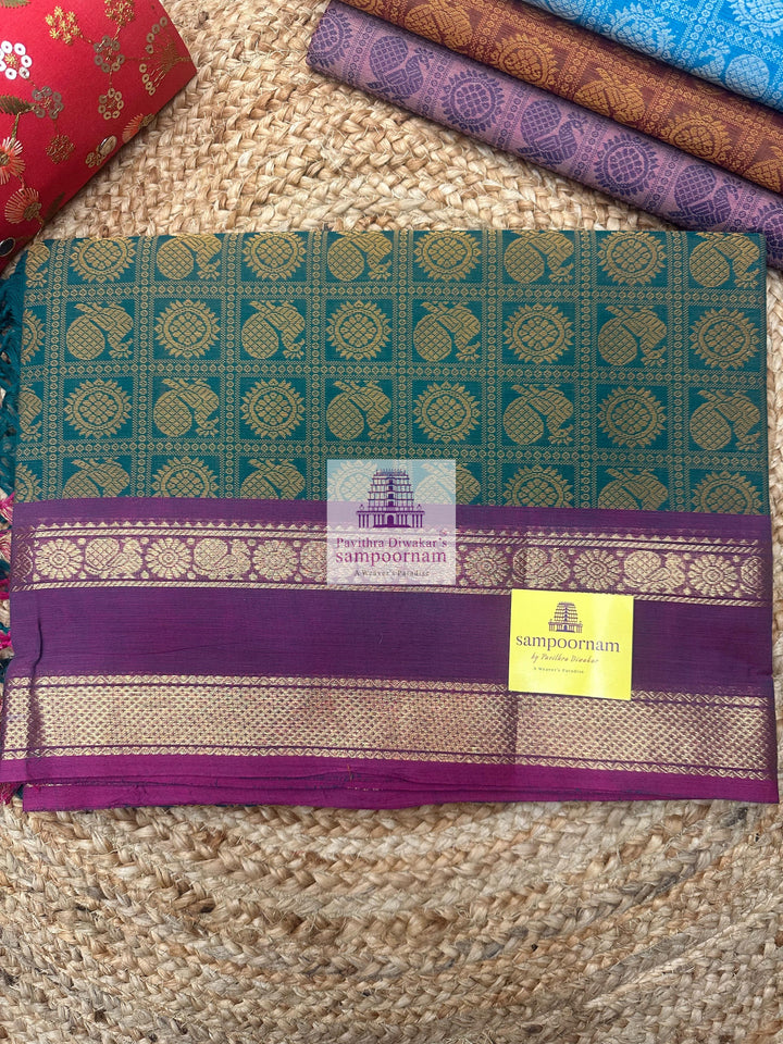 Green with Light Magenta  , Annam and Chakram thread butta in the body  , rettapet border  Chettinad Cotton Saree