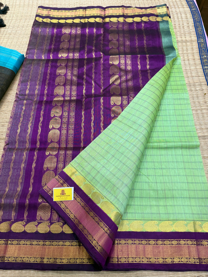 Pastel Green with Purple , kattam in the body , traditional borders and rich Pallu Korvai Silk Cotton Saree