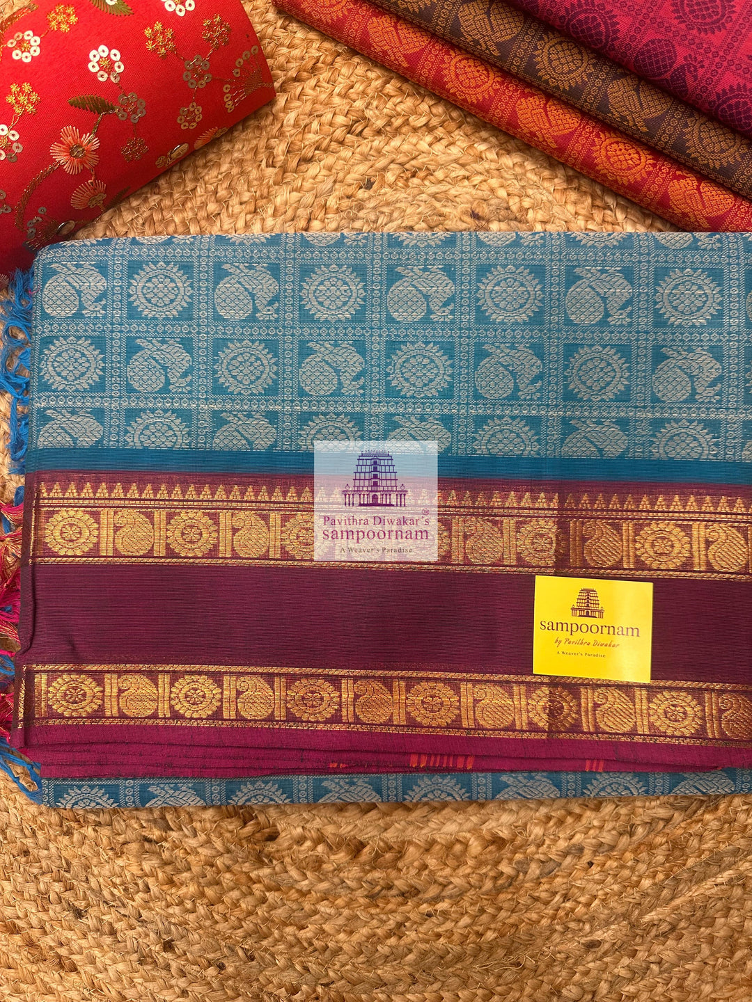 Light Blue with Magenta  , Annam and Chakram thread butta in the body  , rettapet border and Plain  Pallu Chettinad Cotton Saree