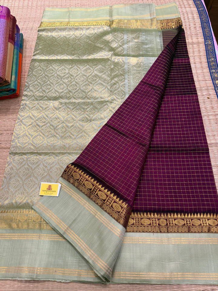 Wine with Pastel Green , rich zari checks in the body , rettapet border and rich Pallu Korvai Silk Cotton Saree
