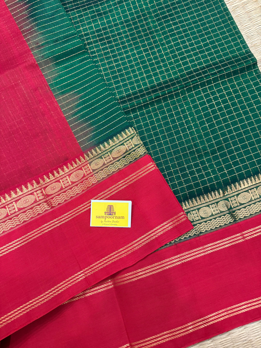 Green with Red , rich zari checks in the body , rettapet border and rich Pallu Korvai Silk Cotton Saree