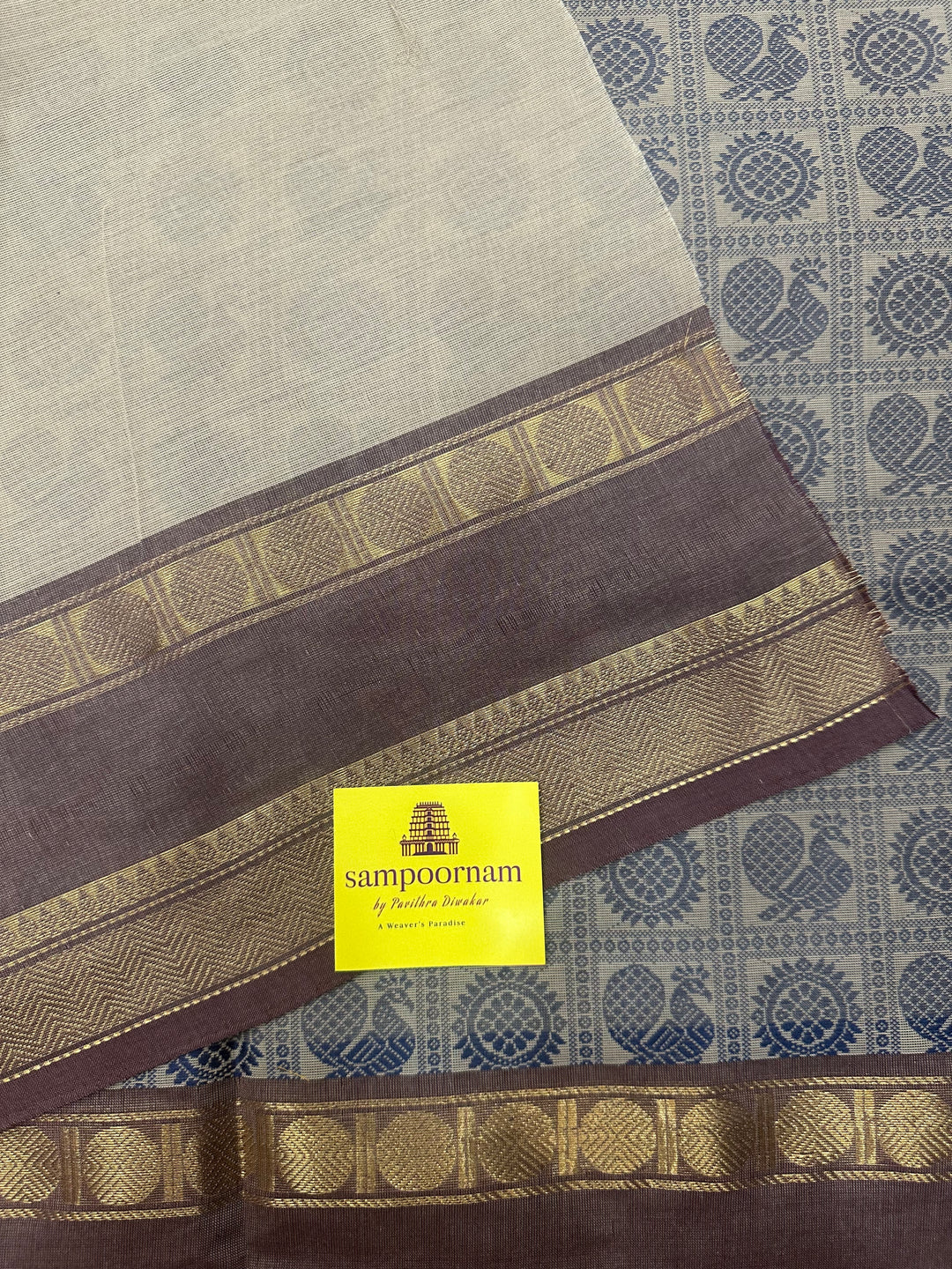 Dark Beige with sandstone   , Annam and Chakram thread butta in the body  , rettapet border and Plain Pallu Chettinad Cotton Saree