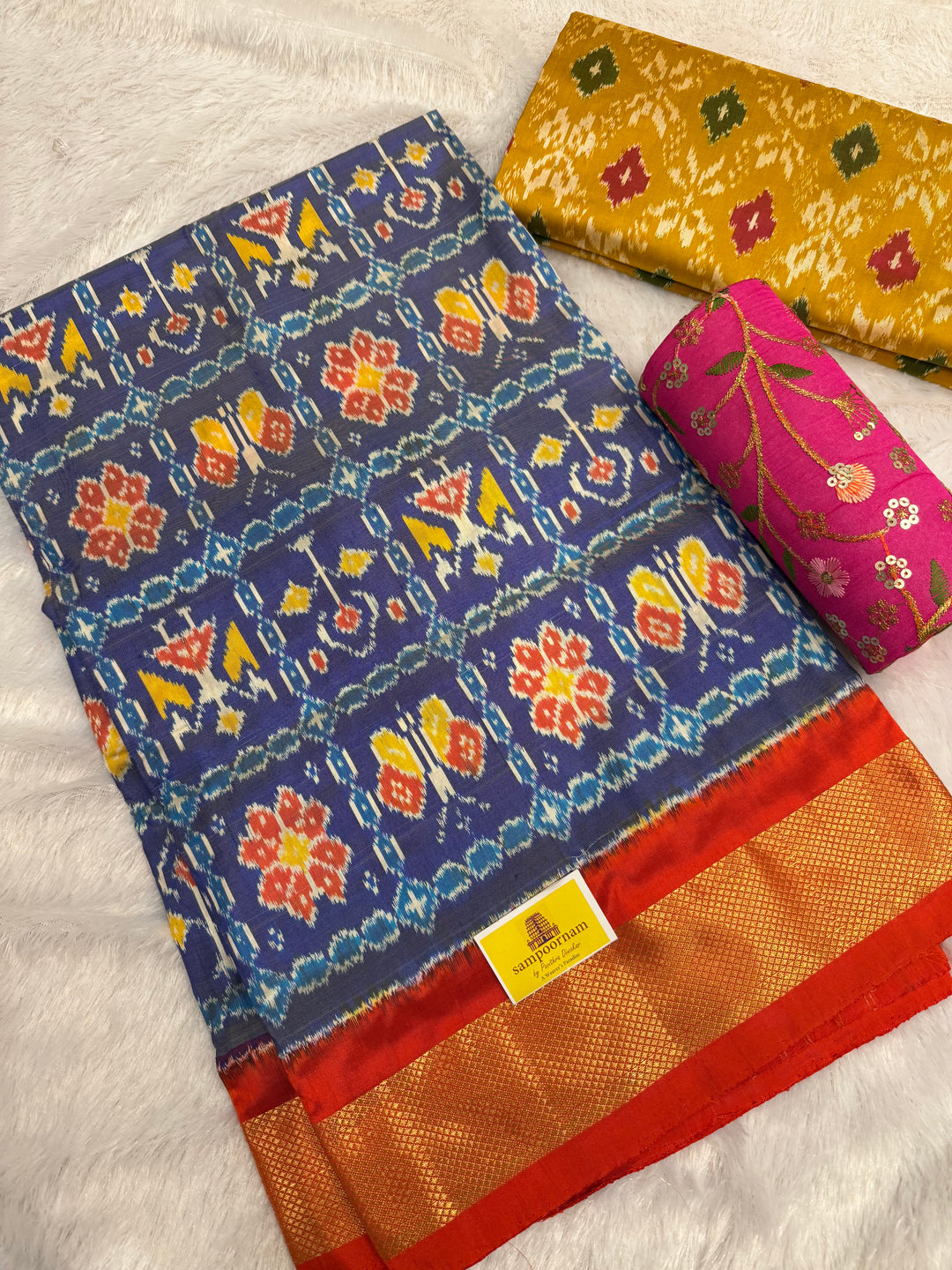 Blue with Orange , traditional borders and rich Pallu Pochampally Ikkat Silk Saree