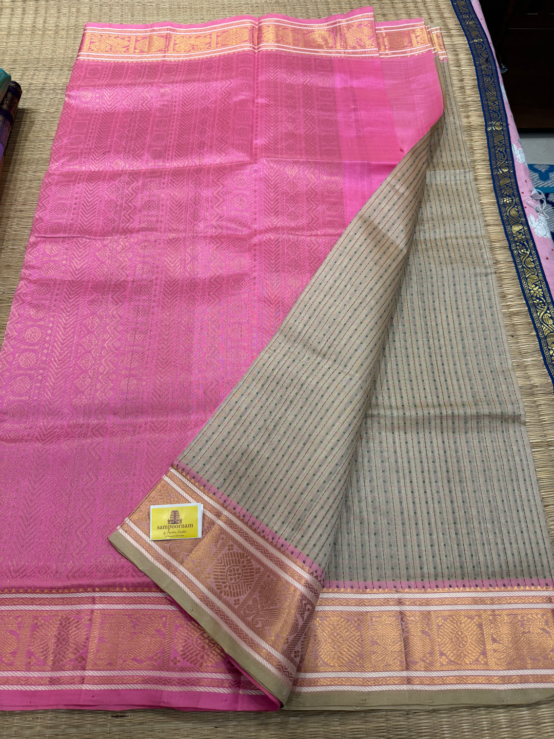 Offwhite with Baby Pink , Lakshadeepam butta in the body , traditional borders and rich Pallu Lakshadeepam Silk Cotton Saree