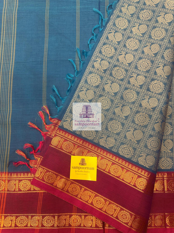 Light Blue with Light Magenta  , Annam and Chakram thread butta in the body  , rettapet border and Plain  Pallu Chettinad Cotton Saree