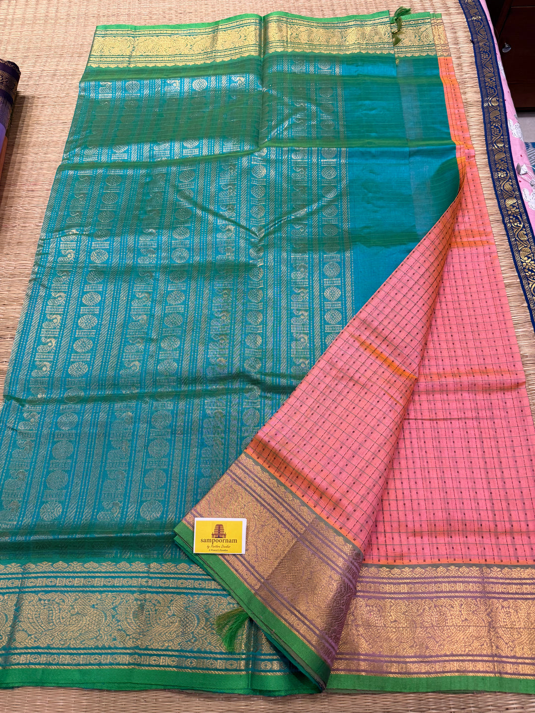 Turquoise Blue with Baby Pink , Lakshadeepam butta in the body , traditional borders and rich Pallu Lakshadeepam Silk Cotton Saree