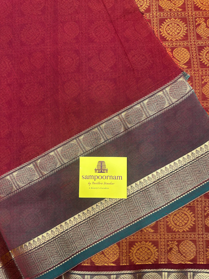 Brick Red with Manthulir Green  , Annam and Chakram thread butta in the body  , rettapet border and Plain Pallu Chettinad Cotton Saree
