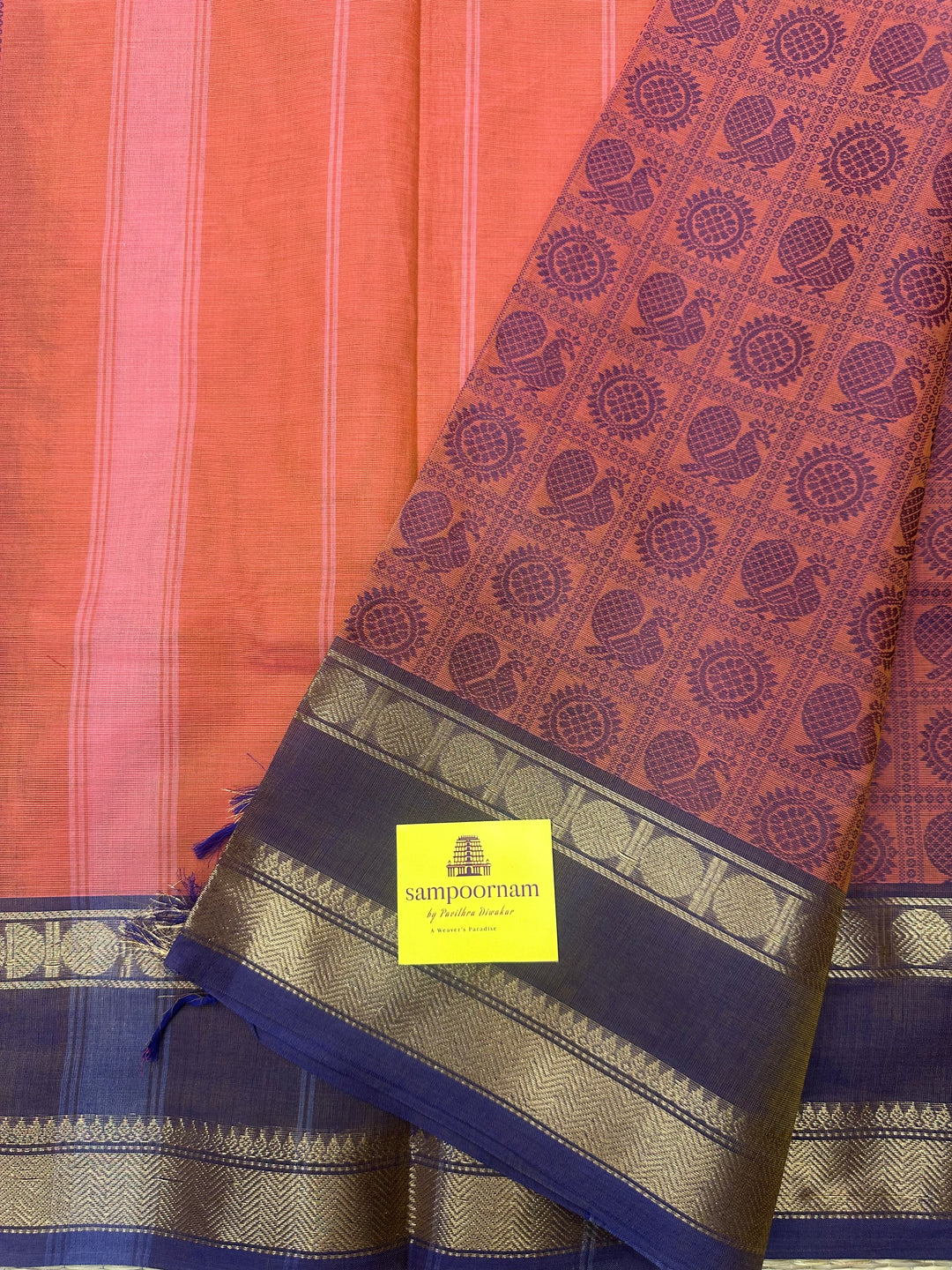 Light Coral with Blue  , Annam and Chakram thread butta in the body  , rettapet border and Plain Pallu Chettinad Cotton Saree
